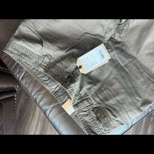 New With Tags!! Men’s Prana dark khaki slim fit pants. 34x32